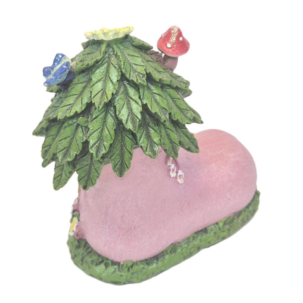 Overhead view of pink fairy boot house with leaf roof toadstool and sunflower - Earth Fairy