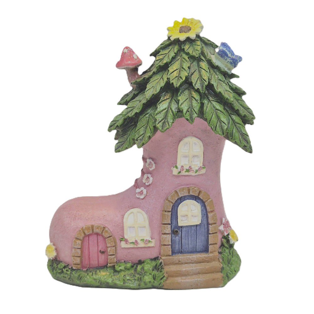 Side view of fairy boot house mini showing leaf roof detail and climbing blossom wall