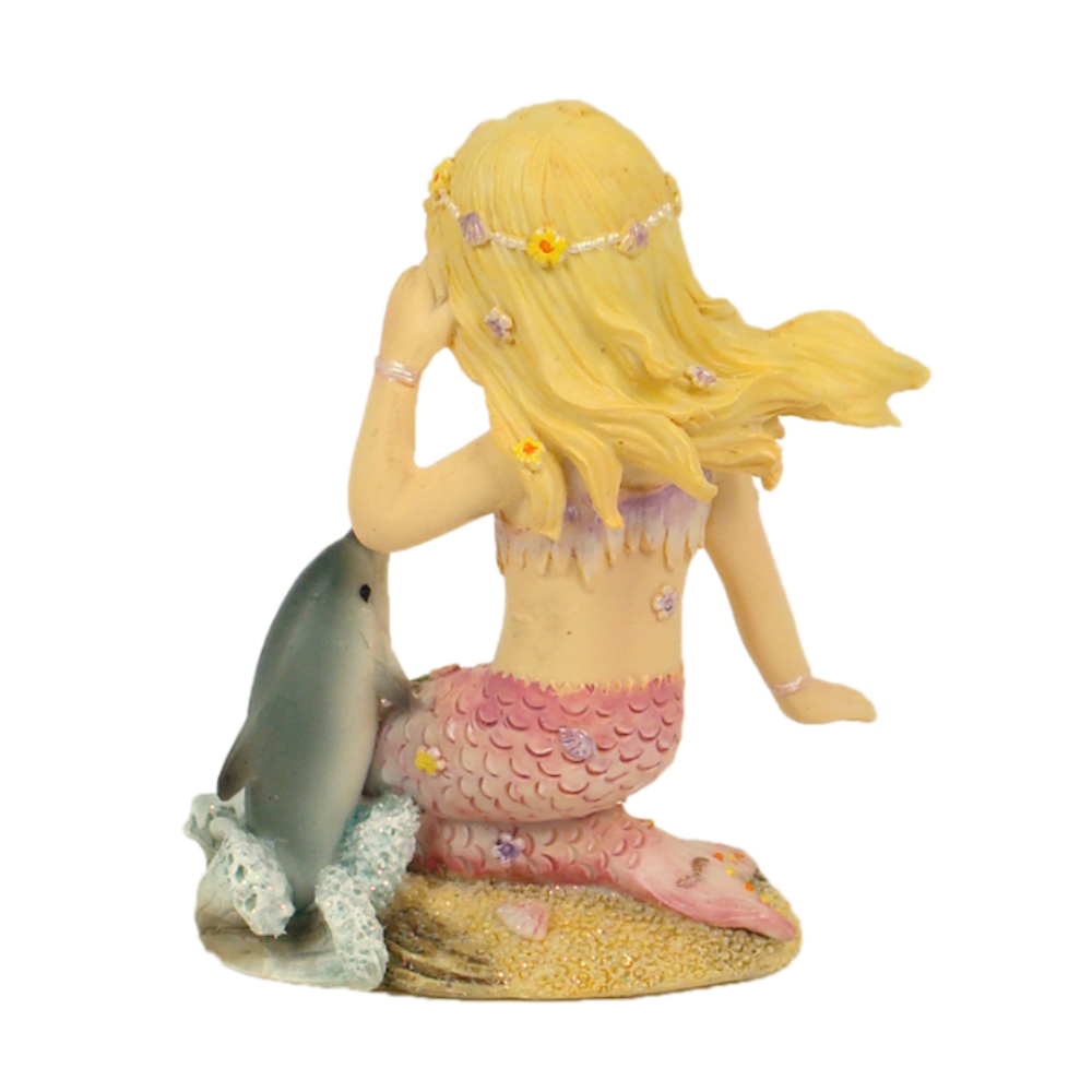 Rear view of mermaid with dolphin figurine showing wind-swept hair and dolphin detail - Earth Fairy