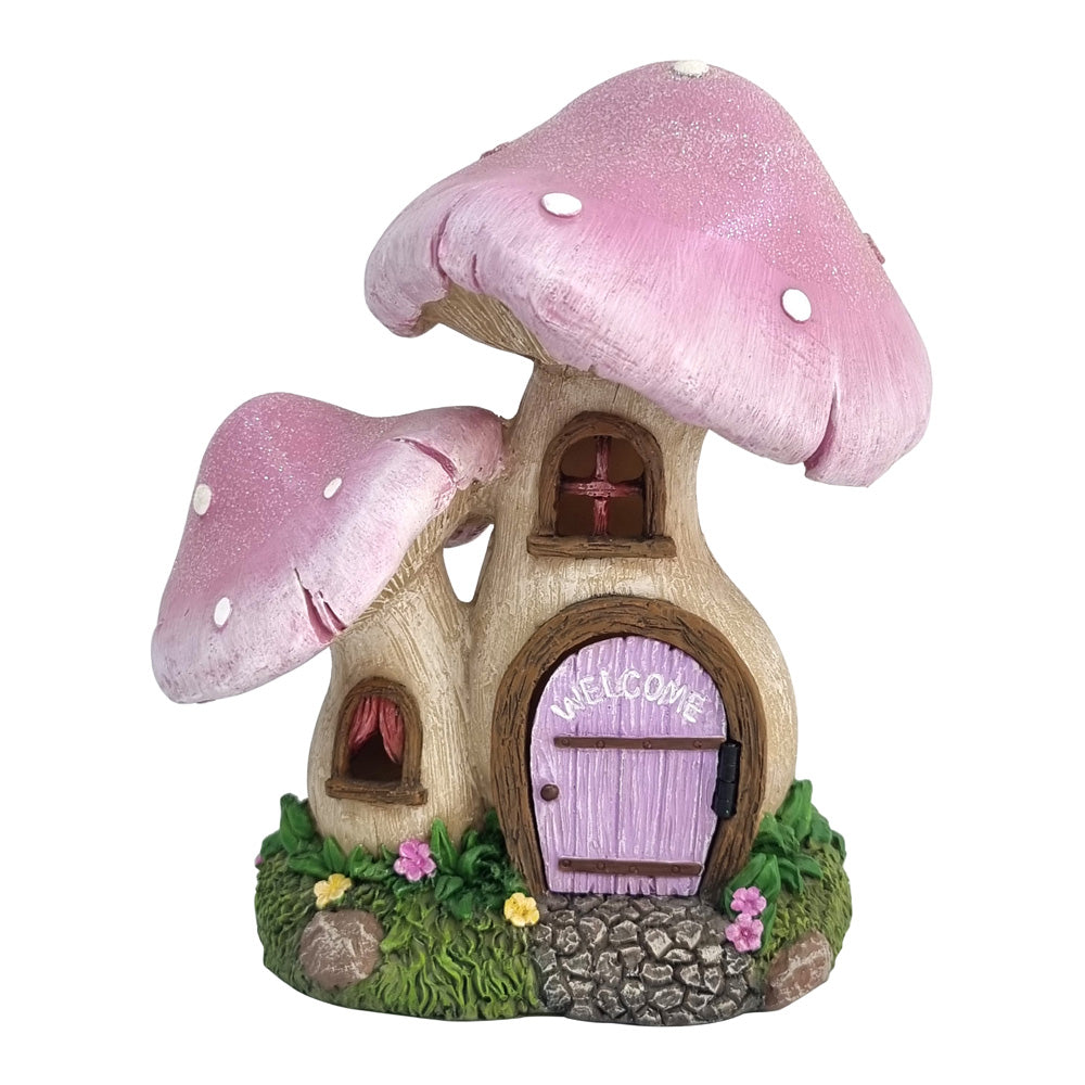 Hand-painted polyresin fairy cottage with three pink toadstool caps and opening lilac door