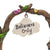Believers Only Garden Arch, a miniature garden arch for the fairy garden, crafted from twisted branches entwined with flowers