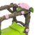 Miniature Fairy Bed with Flower Canopy, a four poster style bed fashioned from wood effect branches, with pink flowering vine twisting around its supports and a green pillow and blanket on the bed