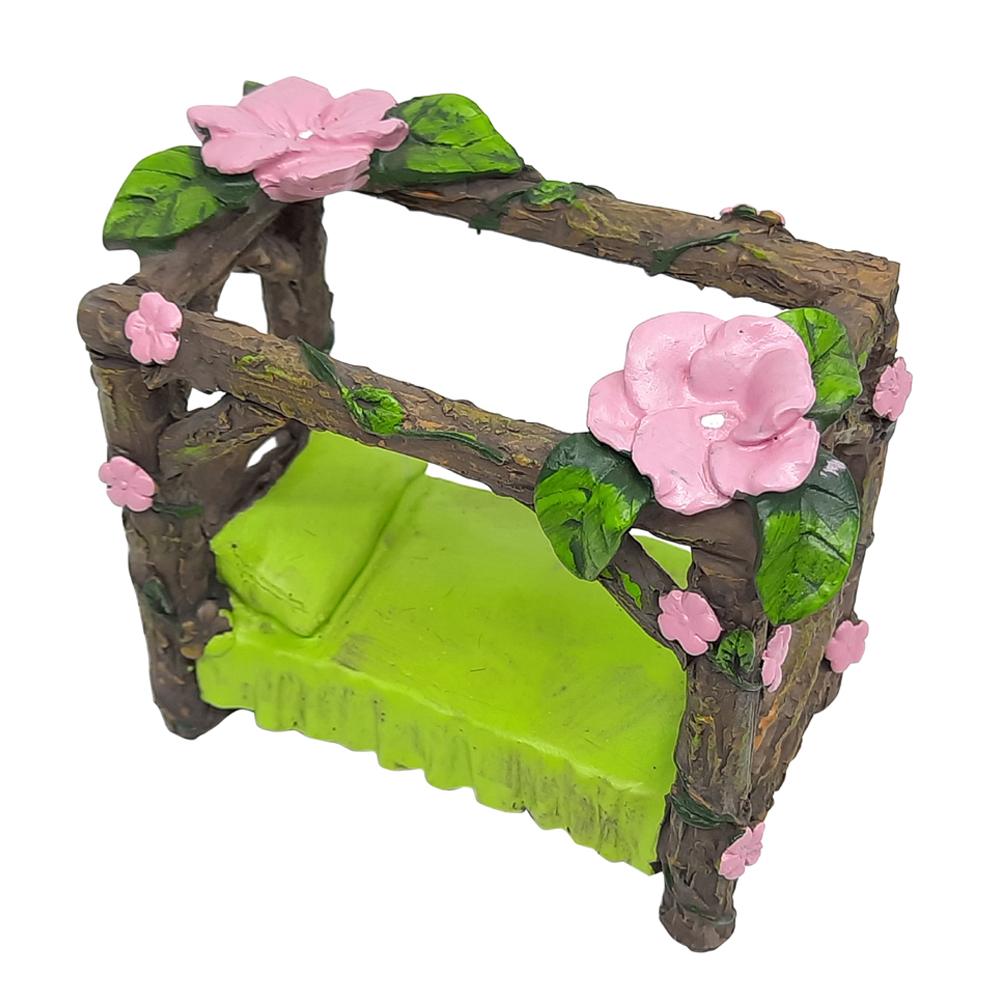 Side View of the Miniature Fairy Garden Bed with Floral Canopy, detailing the branch effect posts, flower canopy and green bedding