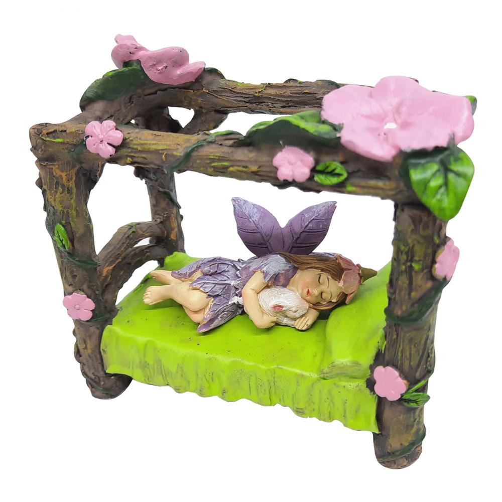Miniature Fairy Bed with Flower Canopy, displayeld with Garden Fairy with Rabbit sleeping on the bed