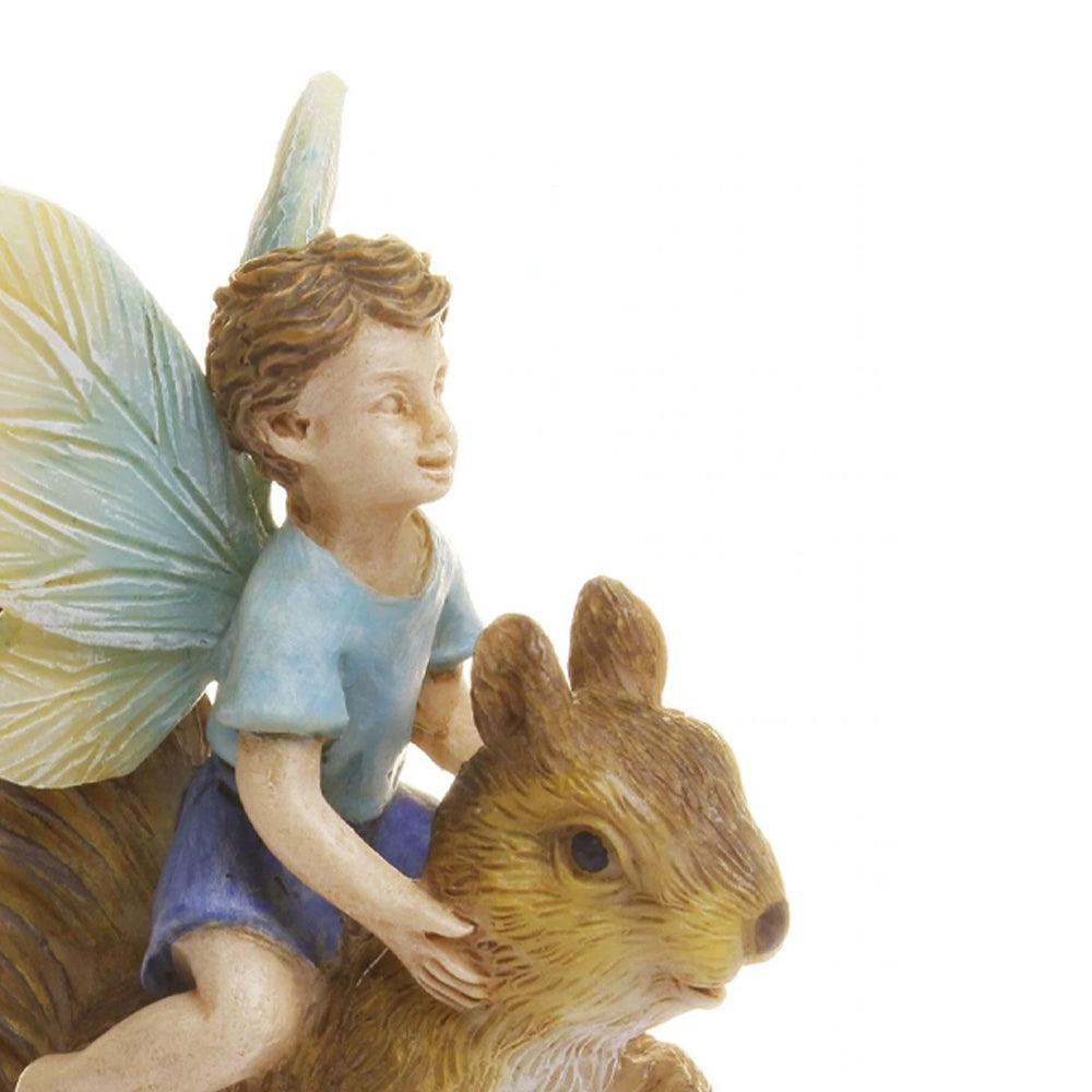 Fairy Boy Riding a Squirrel - close up view