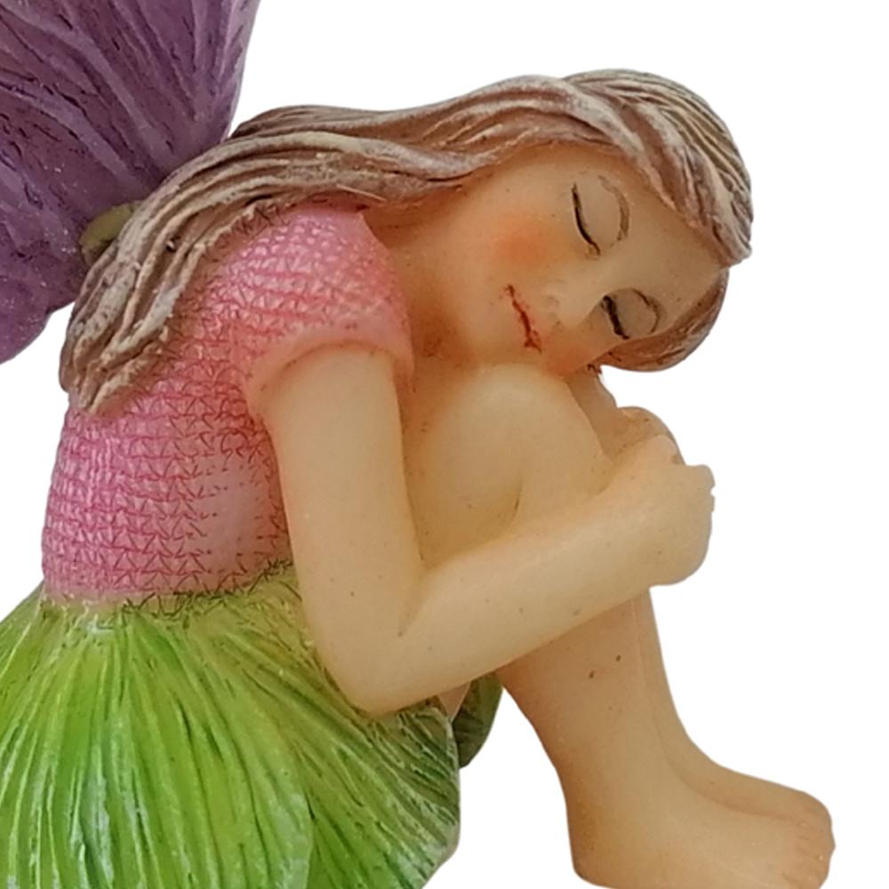 Close up view of face of Fairy Chloe Sleeping, a miniature resin fairy garden figurine