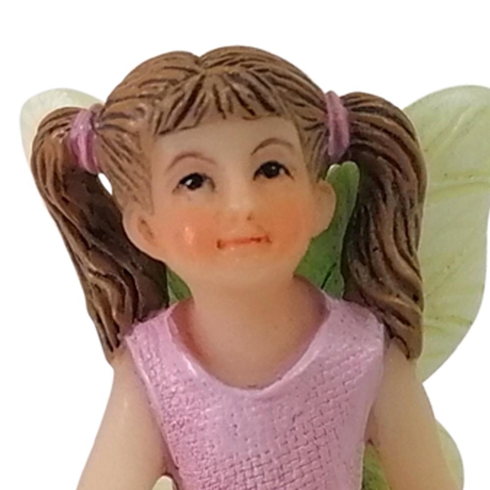 Close up view of the face of the Fairy Harper with Bunny miniature resin fairy garden figurine