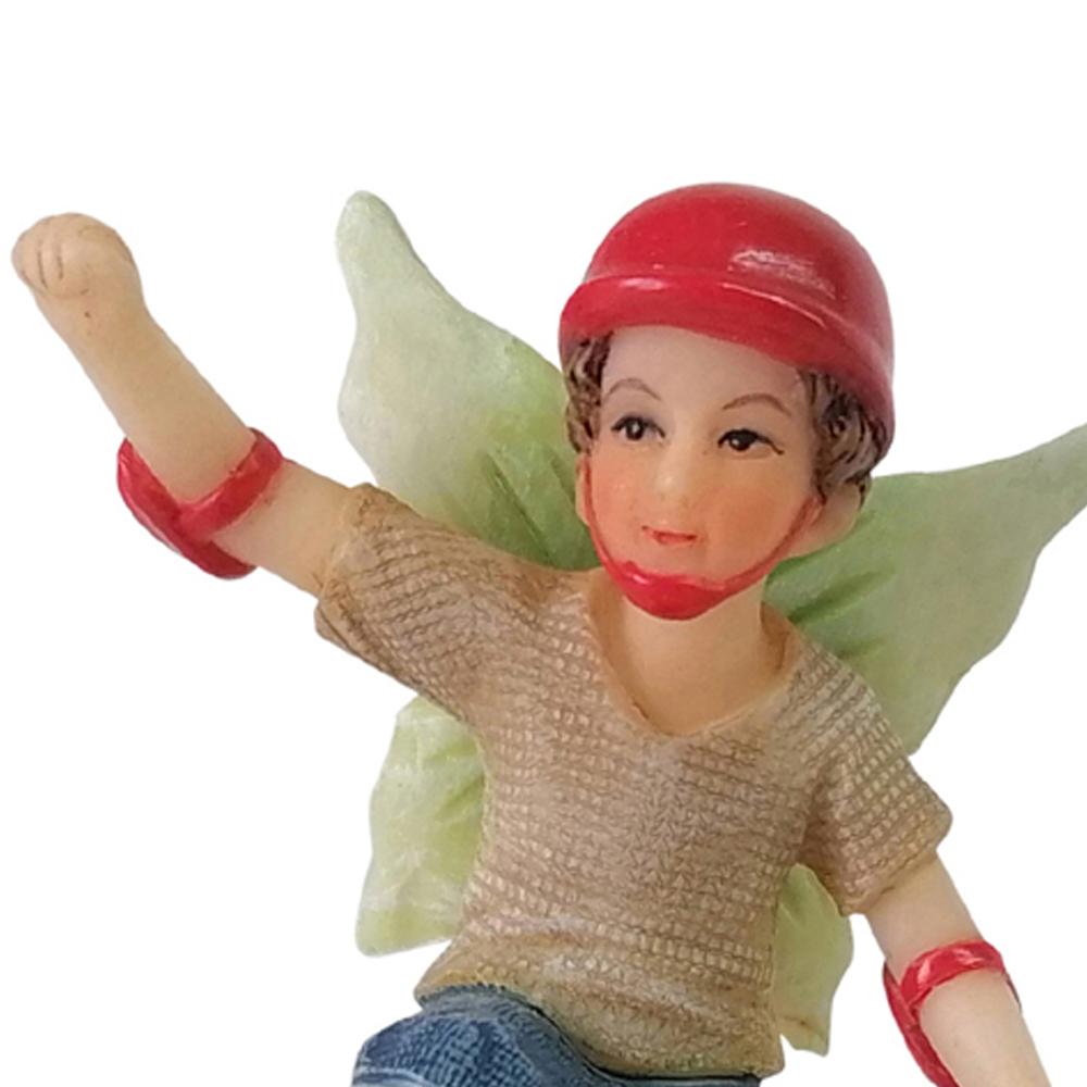 Fairy Noah Riding a Skateboard, a resin fairy garden figurine depicting a boy fairy on a skateboard