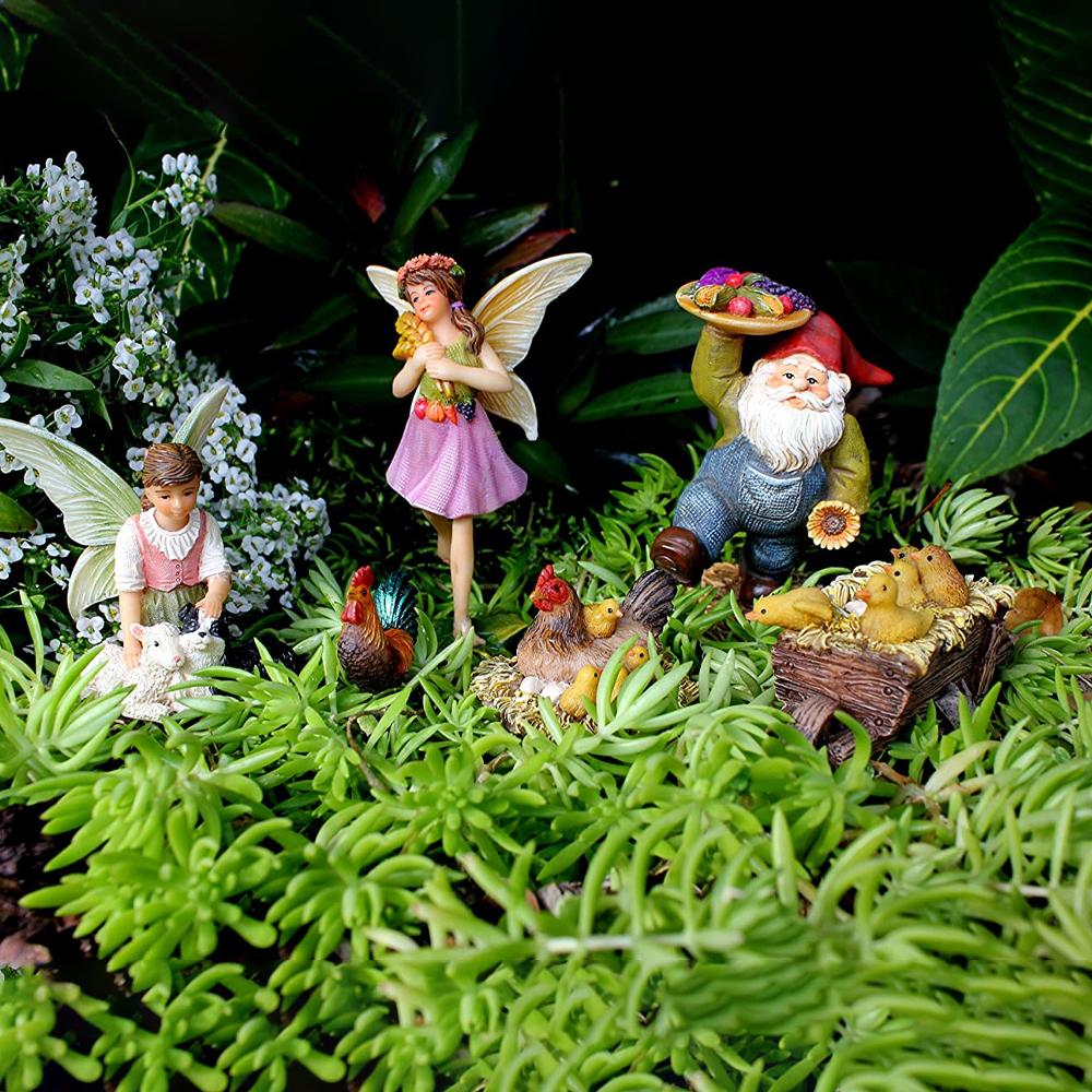 Farm Fairy Set, a set of 6 figurines depicting a fairy farm scene, with Shephard Fairy, Gnome, Farm Fairy and three chicken figurines displayed on a white background