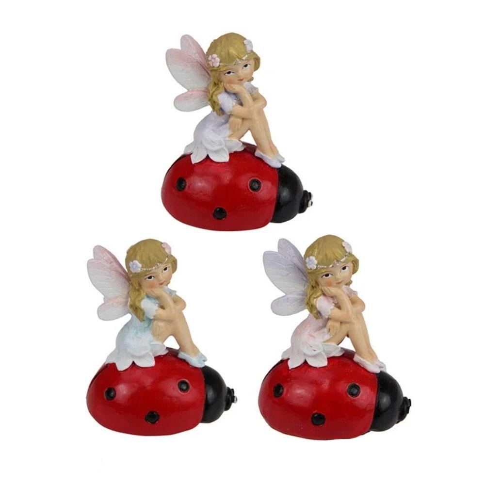 Flower Garden Fairy Sitting on a Ladybug, from The Flower Garden Fairy Collection by Earth Fairy