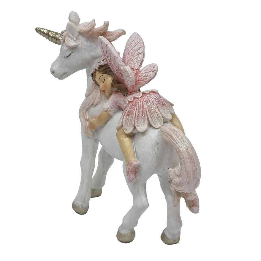 Rear view of miniature fairy riding a unicorn figurine