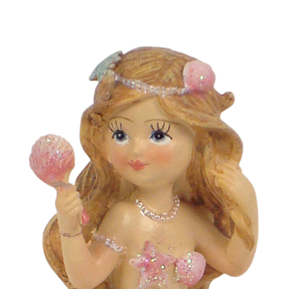 Close Up View of Flower Garden Mermaid Holding a Mirror