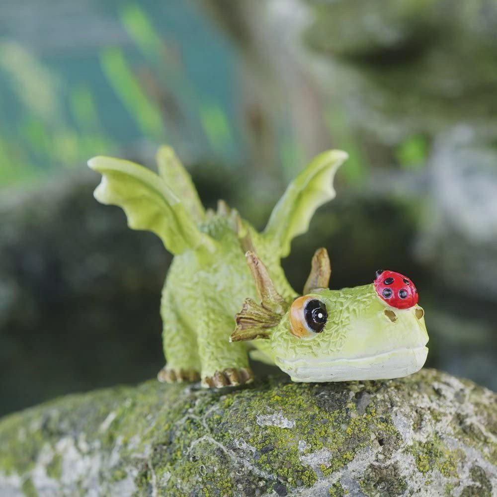 Children are curious creatures, no matter to what species they belong! Take this baby green dragon, for example. A ladybug landed on its nose and it has been fixated on the thing ever since. It is so curious as to what the bug is!  This lovely creature is from The Enchanted Story Collection and has many Green Dragon brothers and sisters to keep him company.