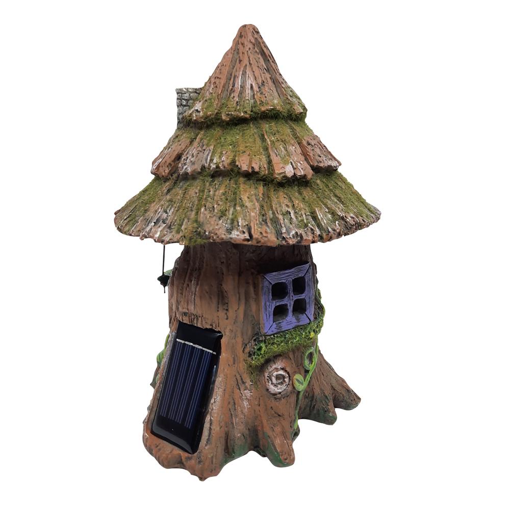 Rear View of solar panel on the Moss Tree House with Hammock - Solar, a miniature fairy house for the garden with mossy wooden roof and purple arched door, and a small hammock hanging to the side