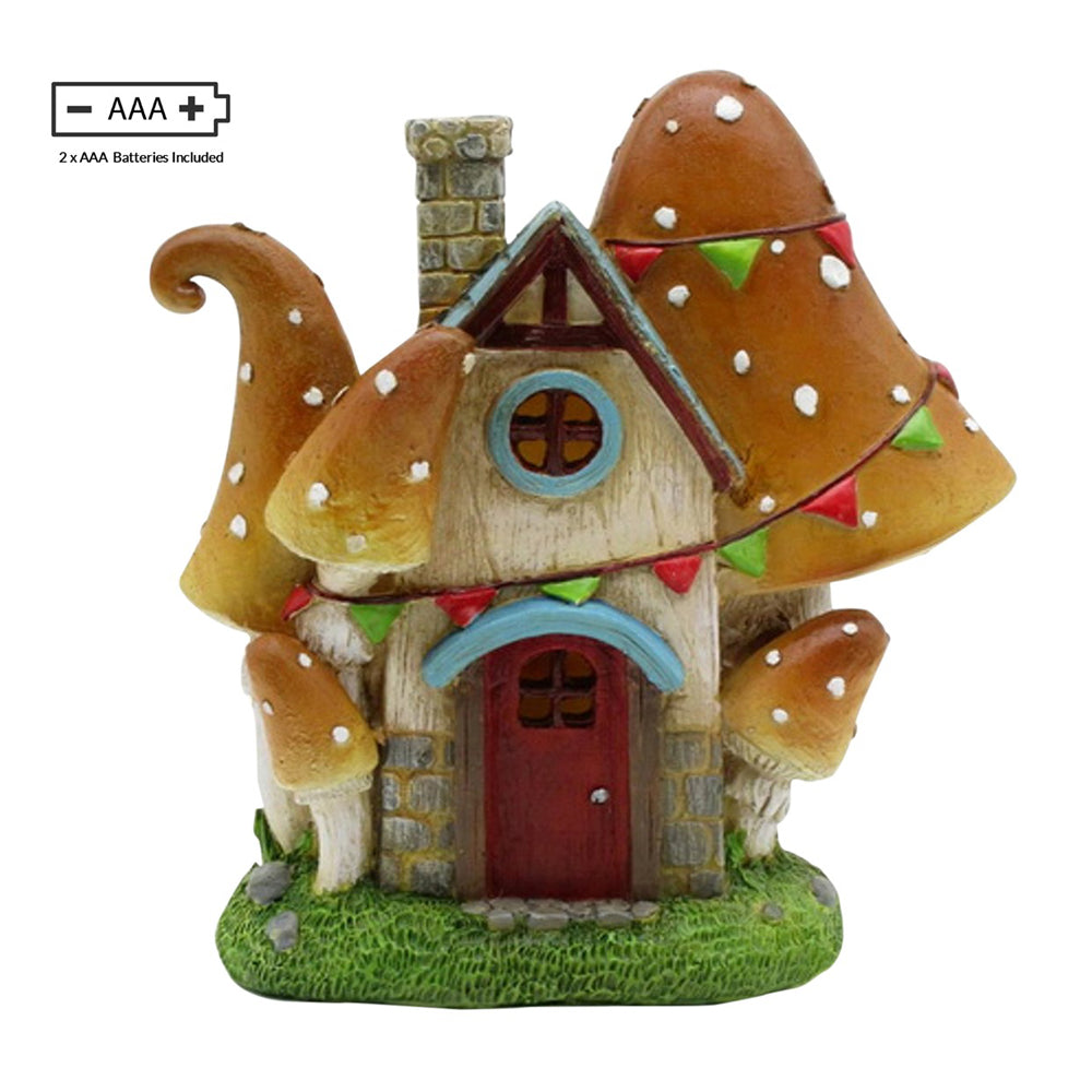 Mushroom Cottage, a minaiture light up fairy house for the garden
