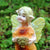 Pin the Woodland Fairy, a miniature polystone fairy for the garden, wars an orange leaf dress and carries an acorn basket