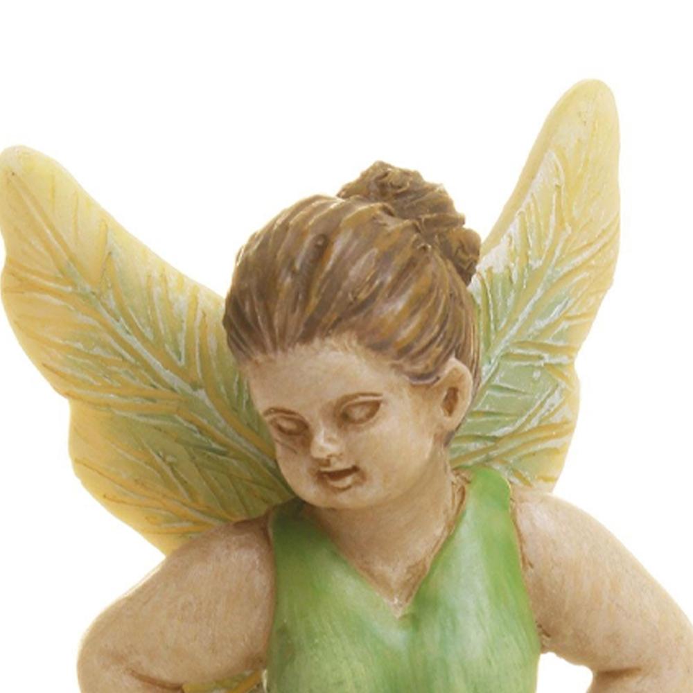 Sassy Fairy, a miniature polystone fairy for the garden, wearing a green dress with yellow wings, and light brown hair in a bun, barefoot